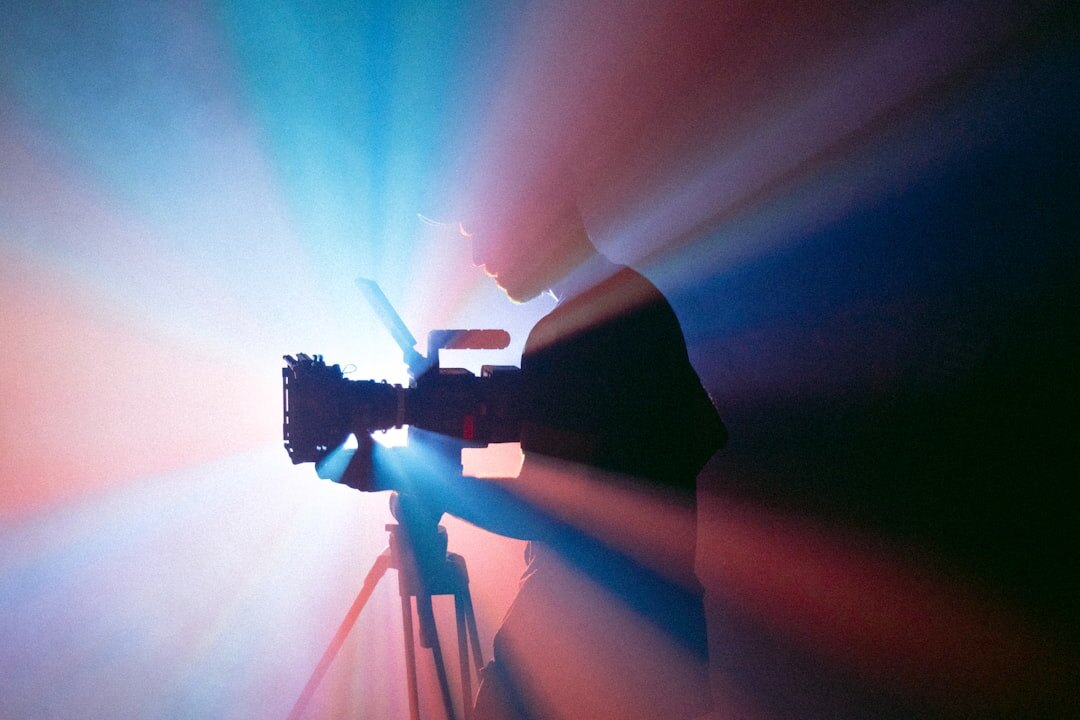 Camera operator filming a professional video shoot