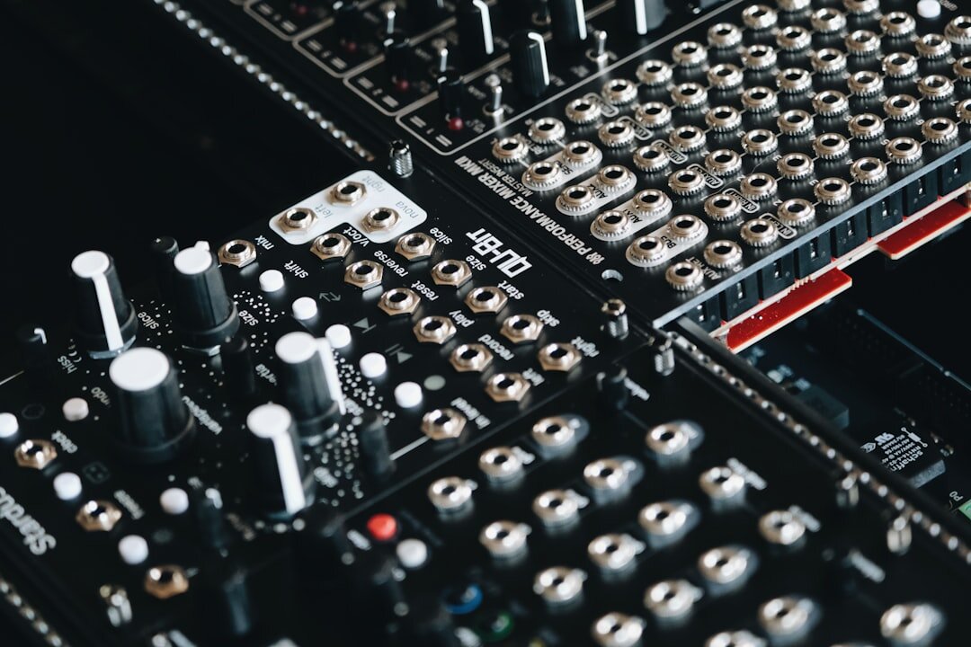 Sound mixing board in a professional audio studio